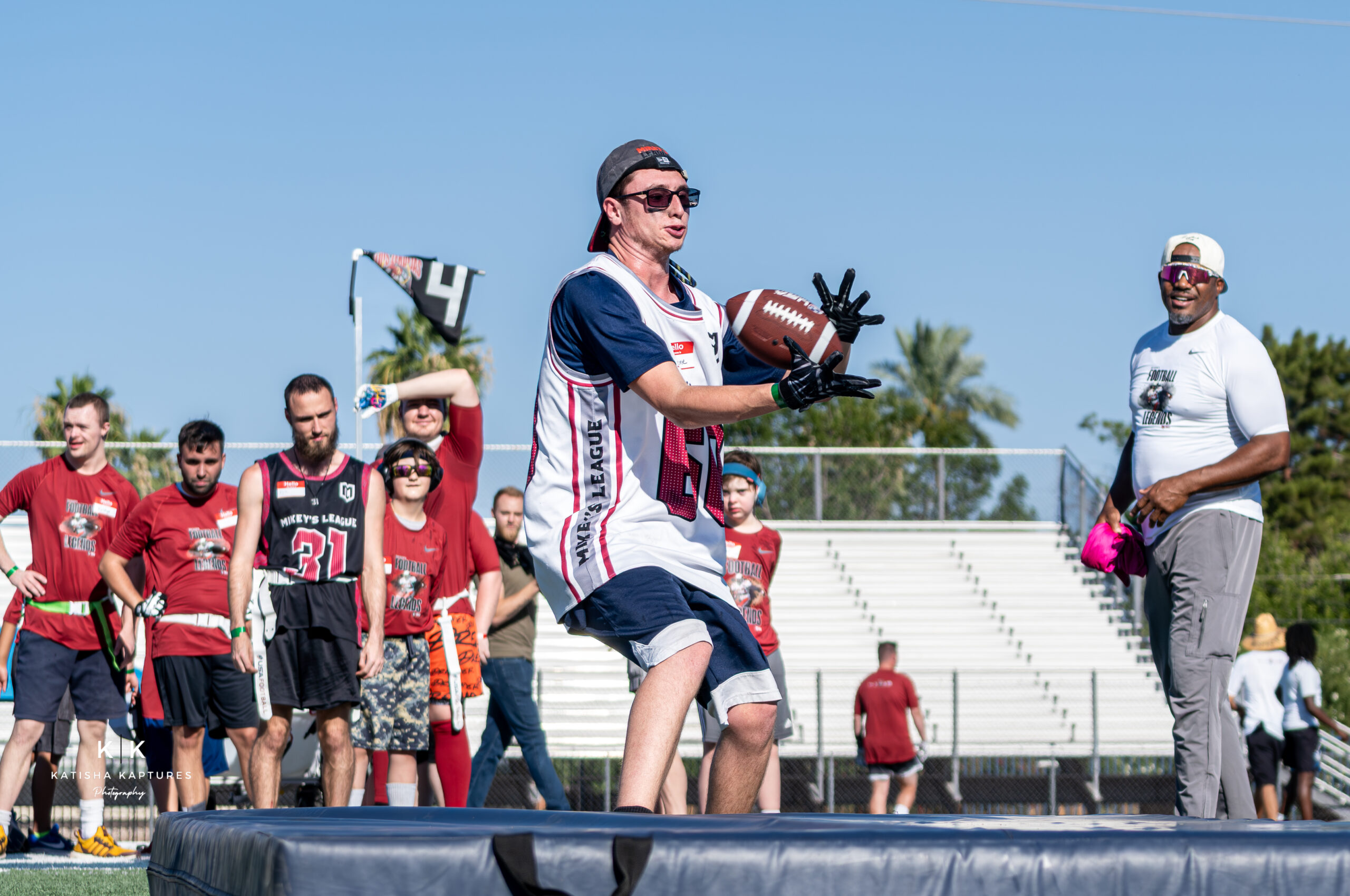 Flag football catch at Mikey's League NFLPA event